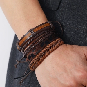 Handmade vintage brown leather braided bracelets in a multi-layer four-piece set for men