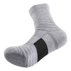 Professional grey cushioned athletic socks with black arch support for running and basketball