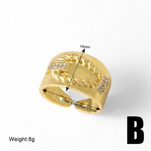 Detailed view of 14mm wide twisted gold ring with zirconia and size specifications