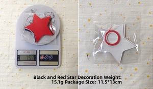 Detail of black and red star garland showing 15.1g weight and 11.5x13cm package size