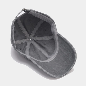 Internal view of grey washed cotton baseball cap with six-panel design and adjustable strap