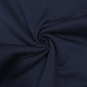 Macro shot of dark navy knit fabric showing detailed texture and soft material quality
