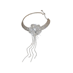 Silver flower tassel necklace featuring sparkling rhinestones on a clean white backdrop