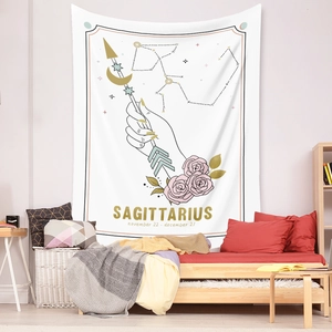 Detail of Sagittarius tapestry with rose and celestial arrow hanging in a bedroom