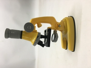 Side view detail of yellow 100X scientific microscope for kids with CE safety mark