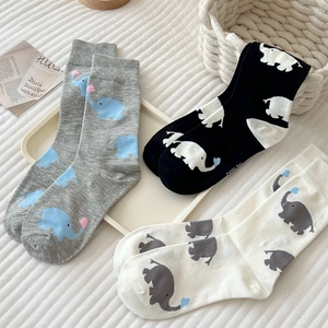 Three pairs of cotton socks in black, white and grey with cute elephant prints