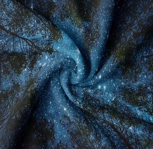 Detail of soft star and forest tapestry fabric showing digital print and texture