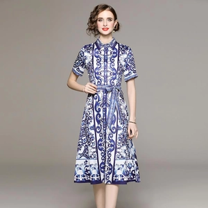 Elegant blue floral midi dress with matching belt and short sleeves for a slim fit