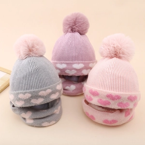 Winter knit hat and scarf set for girls with heart patterns and faux fur pom-poms