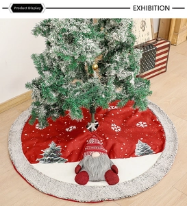Close-up of a red linen Christmas tree skirt featuring a 3D gnome doll and plush edge