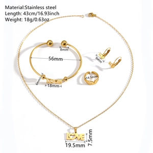 Minimalist gold stainless steel jewelry set with LOVE heart necklace and bracelet on white background