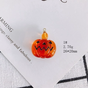 Detail view of 26x20mm orange acrylic pumpkin charm for Halloween DIY crafts