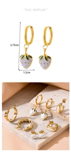 Detail view of strawberry earrings in gold with dimensions and elegant stone display