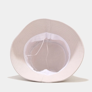 Inside view of a beige cotton sun hat with adjustable drawstring and sweatband details