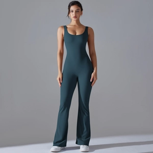 Detail of slim fit dark green backless yoga bodysuit with stylish flared pants