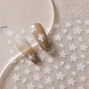 Elegant 3D white cherry blossom nail stickers with pearl accents on gradient nails