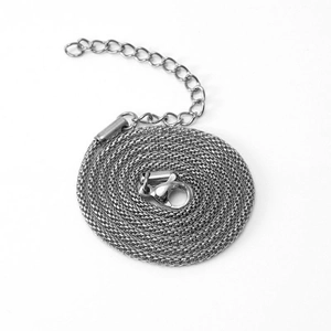 Close-up of silver stainless steel box chain with lobster clasp and extension link