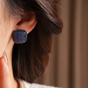 Vintage style square stud earrings with blue cubic zirconia pavé and silver needles