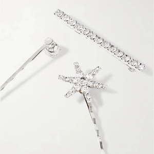 Three-piece silver rhinestone hair clip set featuring star and wave designs on white background