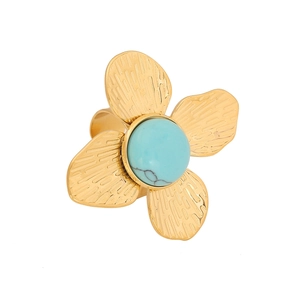 French vintage style gold flower ring with turquoise stone in a brushed metal finish