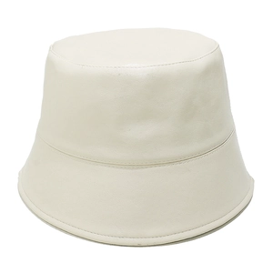Close-up of white PU leather bucket hat showing high-quality texture and wide brim