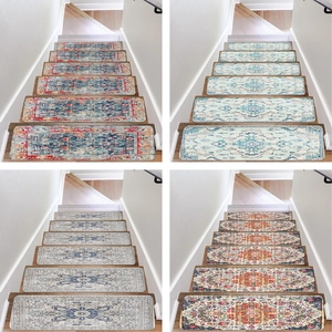 Detail showing four vintage Persian style non-slip stair treads in various floral patterns