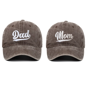 Detail of embroidered Dad and Mom lettering on retro washed cotton baseball caps