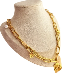 Double layered 18K gold plated stainless steel ocean necklace with shell and starfish
