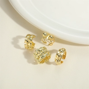 Set of 14K gold plated star and beaded ear cuffs with woven textures and adjustable design