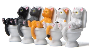 Set of five cartoon cat figurines sitting on miniature toilets for desktop decor
