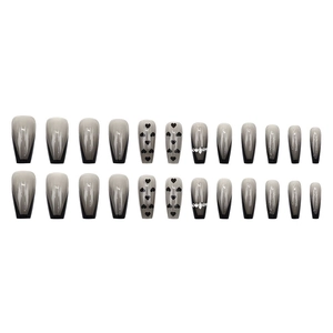 Long ballerina press-on nails set with black heart dots and rhinestones gradient