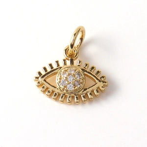 Detailed view of evil eye jewelry pendant with micro-pave cubic zirconia in gold plating