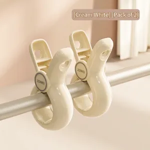 Set van 2 grote crèmewitte winddichte dekbedclips met antislipontwerp voor drogen