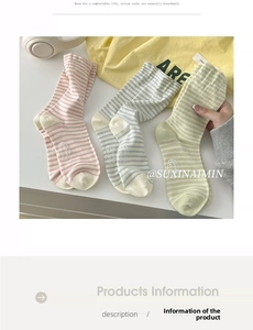 Close-up of pastel striped cotton crew socks in pink, blue, and green for breathability