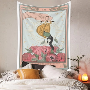 Cozy home setting with The Tea Tarot tapestry hanging above a bed in soft lighting