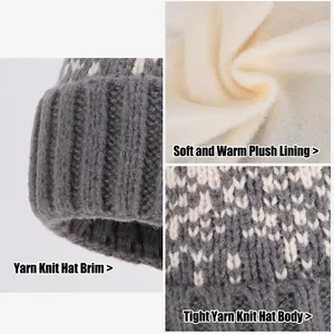 Winter knitted pom-pom hat for women with geometric pattern and thick warm fleece lining