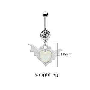 Detail view of heart-shaped belly button ring with wings and dimensions 18mm 5g
