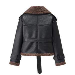 Detail of black faux leather aviator jacket with brown shearling collar and belted hem