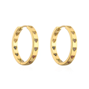 Macro detail of gold-plated hoop earrings with multi-colored heart-shaped zircon stones