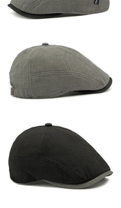 Détail d'une casquette plate vintage avec texture gaufrée et boucle latérale en métal