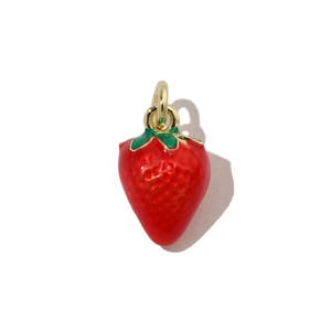 Close-up of red strawberry charm with green leaves and gold ring for DIY jewelry making