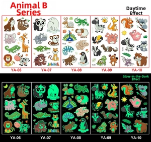 Luminous animal tattoos for kids showing day and night glowing effects on colorful stickers