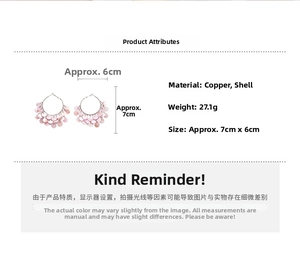 Detail view of pink shell tassel hoop earrings with size dimensions and product specs