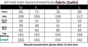 Size chart for satin printed pants showing waist and hip measurements in centimeters