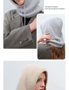 Detailed close-up of knitted balaclava texture and drawstring hood in light grey and beige