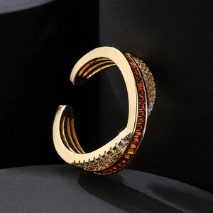 Minimalist gold open ring with orange baguette zircon and white crystal accents