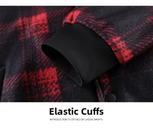 Detail of red and black checkered jacket sleeve with windproof ribbed elastic cuff