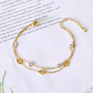 Gold double-layered stainless steel bracelet with evil eye and heart zircon pendants