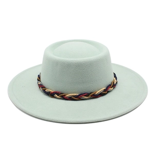 Detail of mint green wool felt jazz hat featuring a four-color woven decorative band