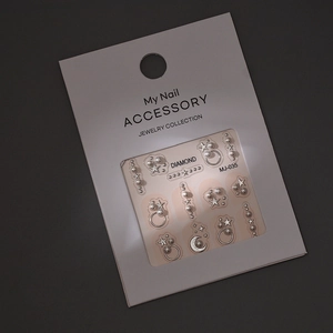 French minimalist star and moon nail art jewelry set with pearls for nail decoration